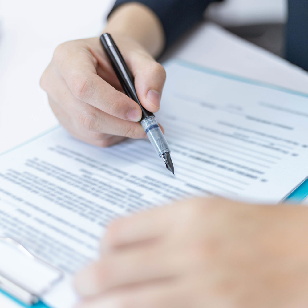 business-partners-concept-young-businessman-holding-pen-pointing-profit-summary-recent-month-showing-document-forms